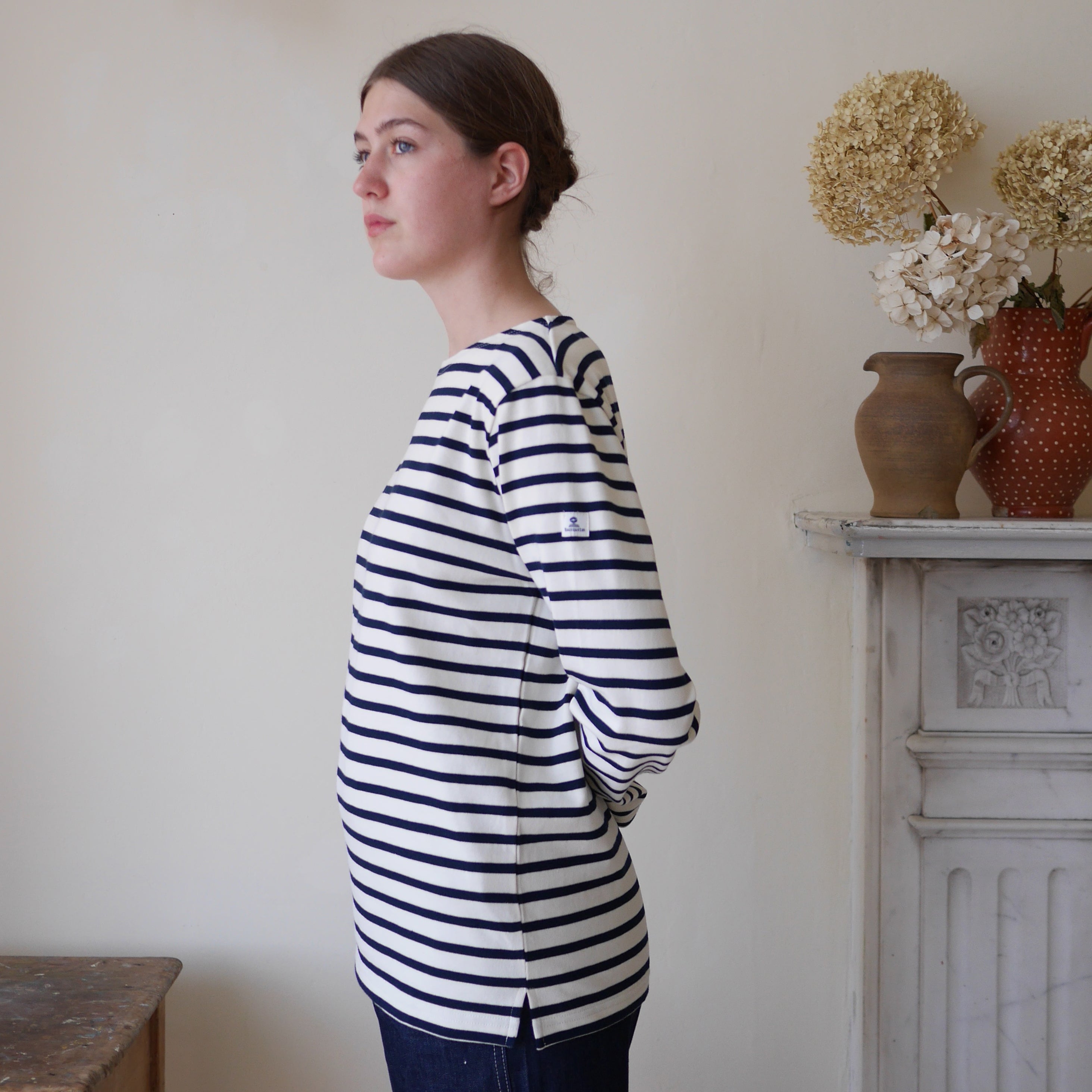 Breton top by Mousqueton on woman in cream and navy