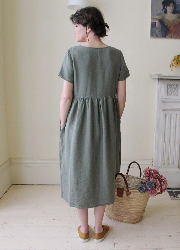 Handmade front button linen dress in Olive Green, back view
