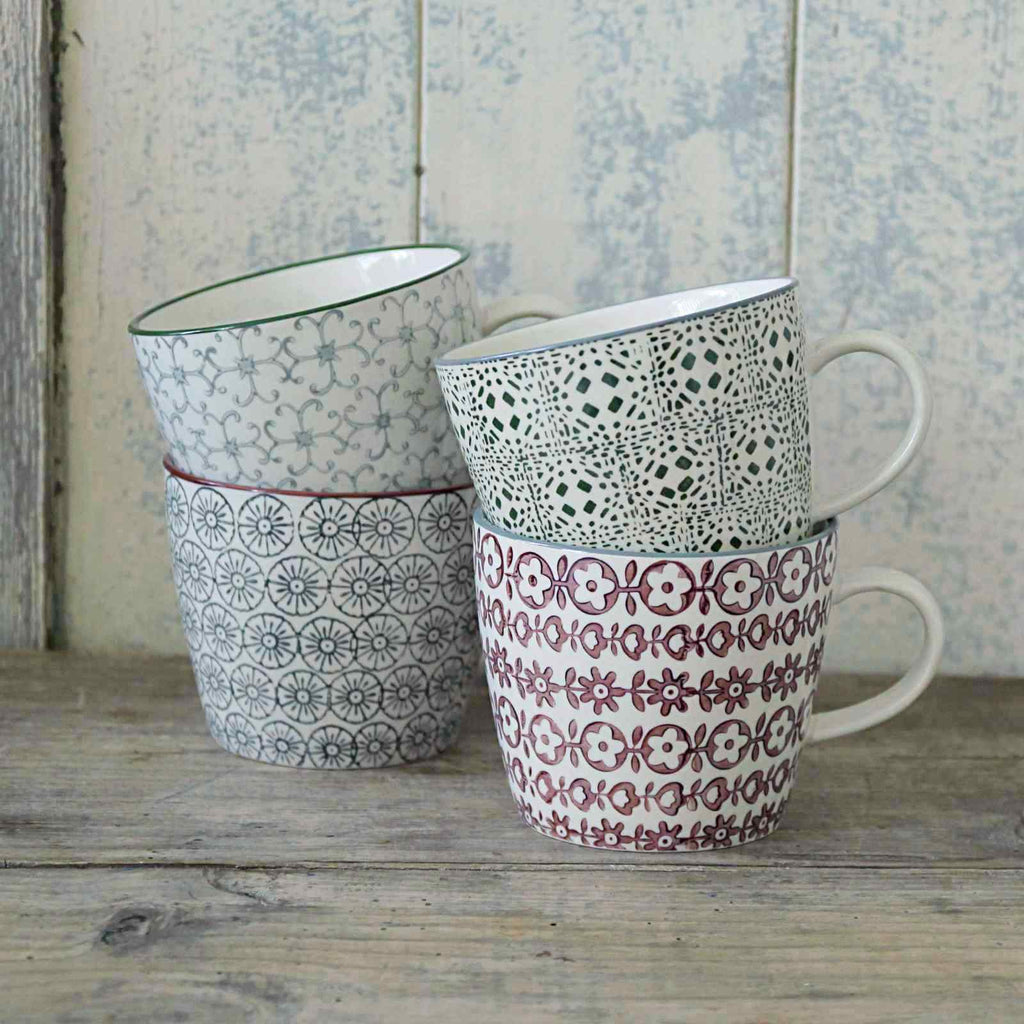 Hand printed ceramic coffee mug, available in a variety prints