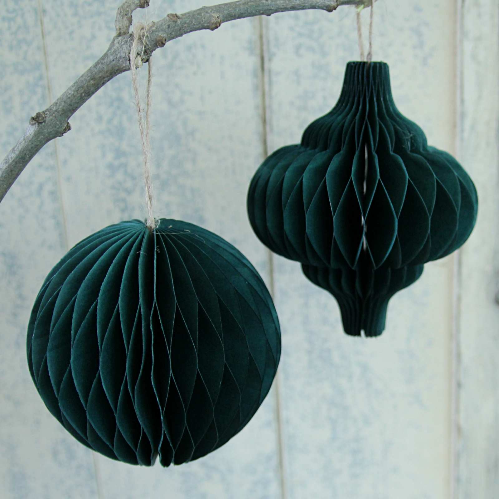 Sustainable Christmas decoration. Honeycomb decoration in Forest Green, made from paper.