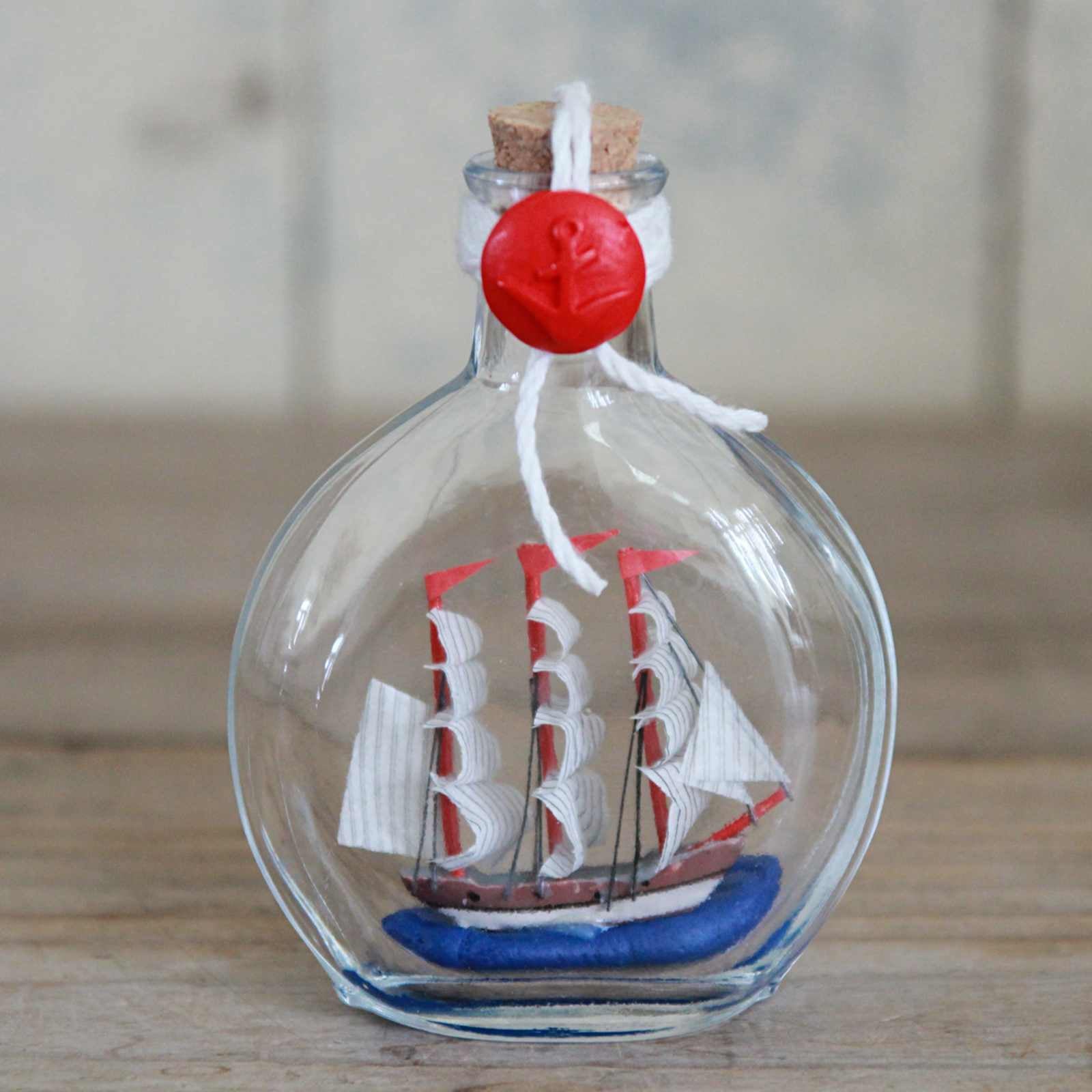 Ship in a round glass Bottle