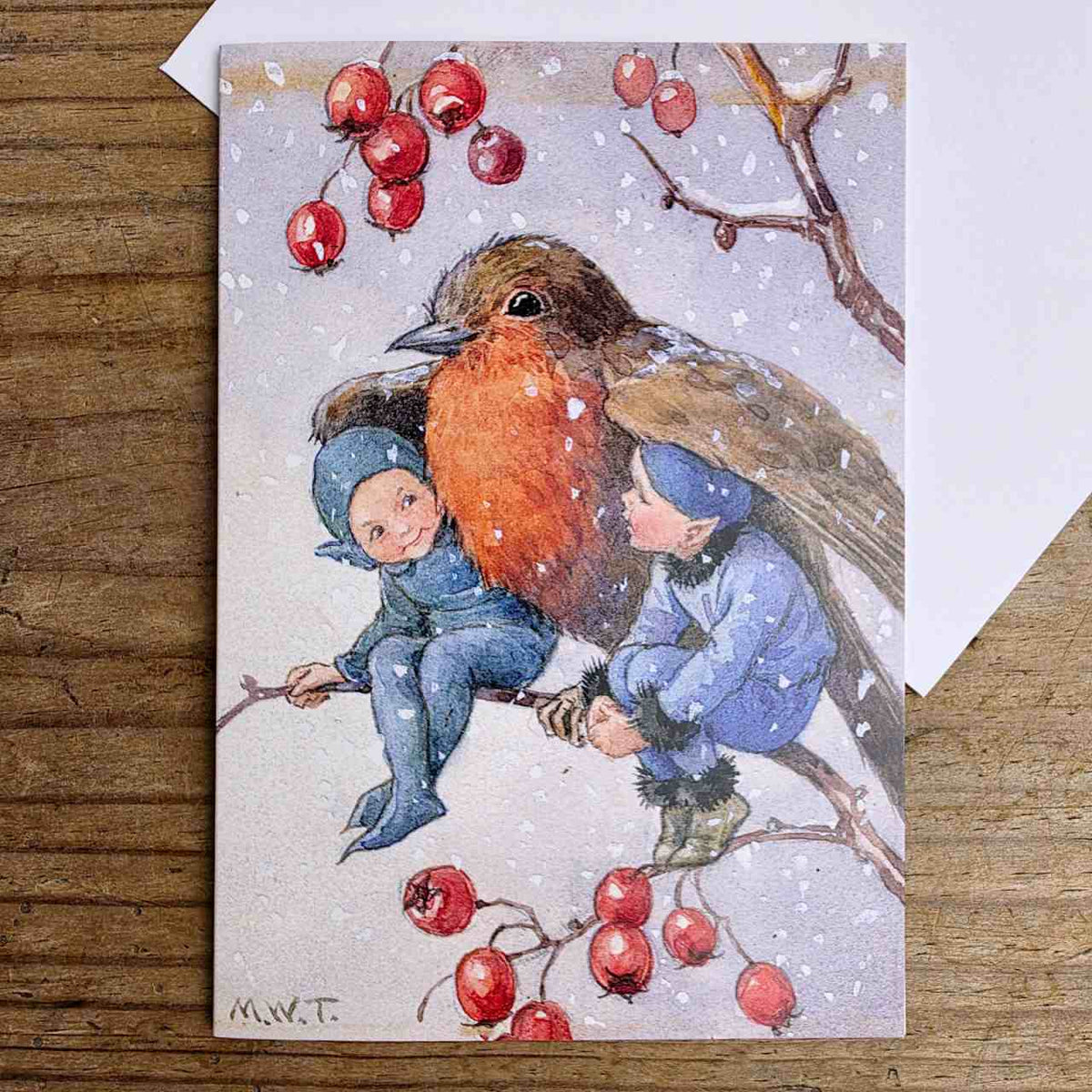 Traditional Christmas Card Pack - Kind Robin, a beautiful illustration by Margaret Tarrant.

Pack of 5 Traditional Christmas Cards with white envelopes.