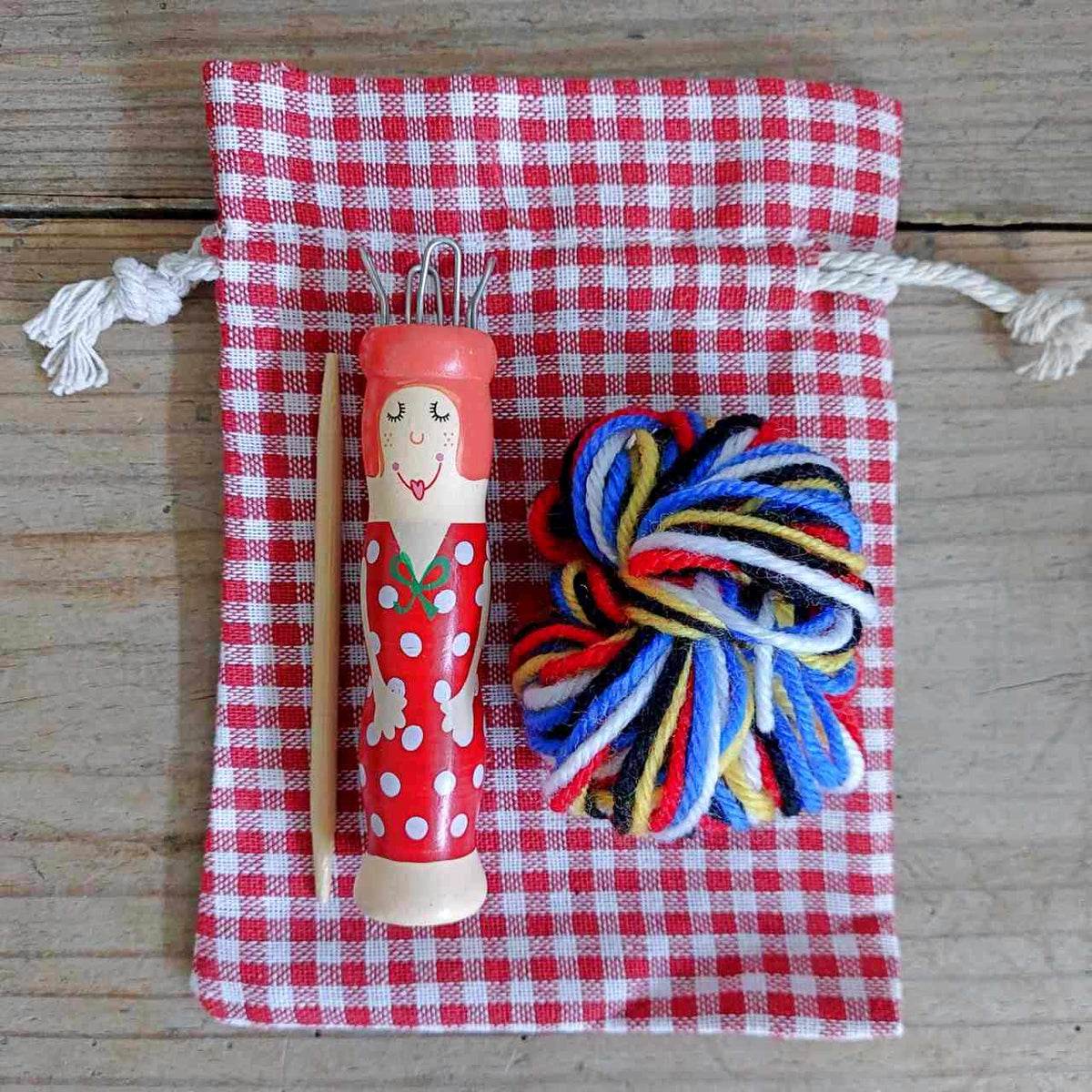 Wooden Knitting Doll in Gingham Bag