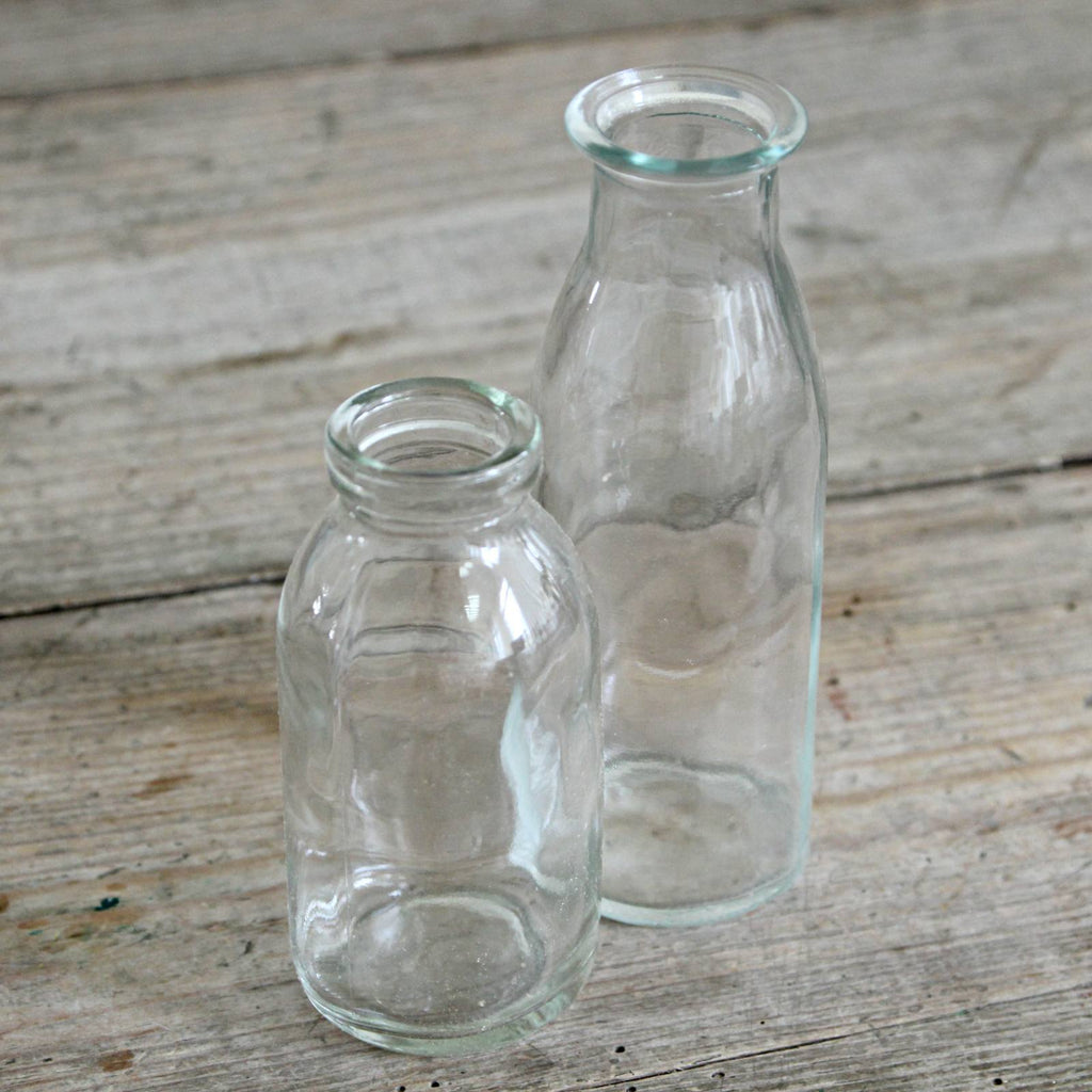 Mini milk bottle, lovley to use as a little milk jug, or perfect for a sprig of flowers