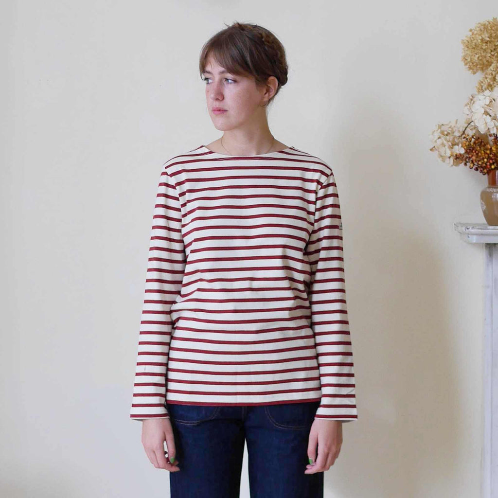 Breton top by Mousqueton on woman in cream and brick
