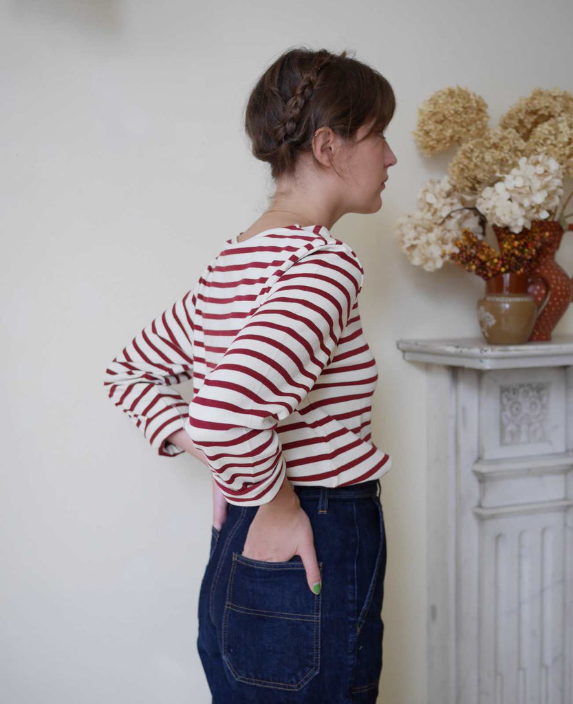 Breton top by Mousqueton on woman back view in cream and brick colour