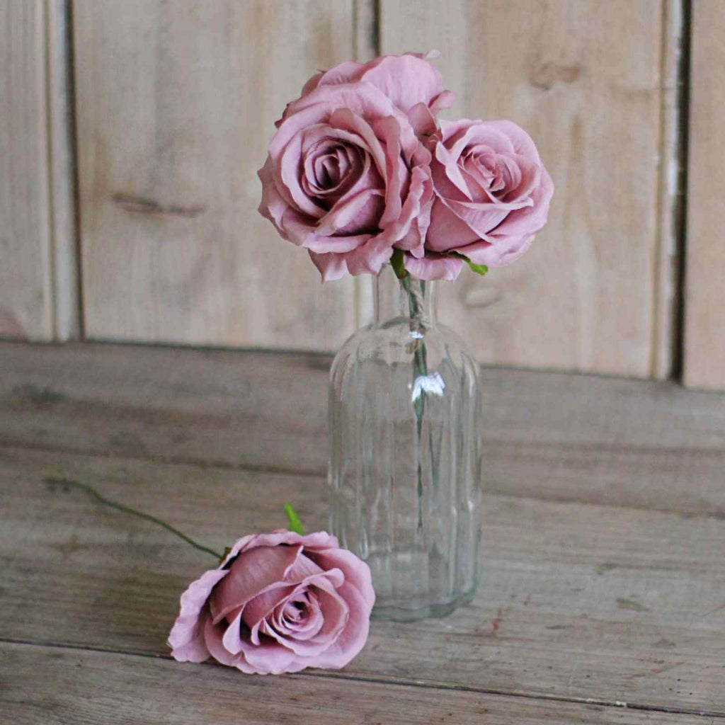 Silk flowers - pink roses in glass vase