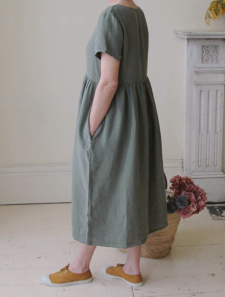 Handmade front button linen dress in Olive Green with pockets and Bensimon tennis shoes in Mustard
