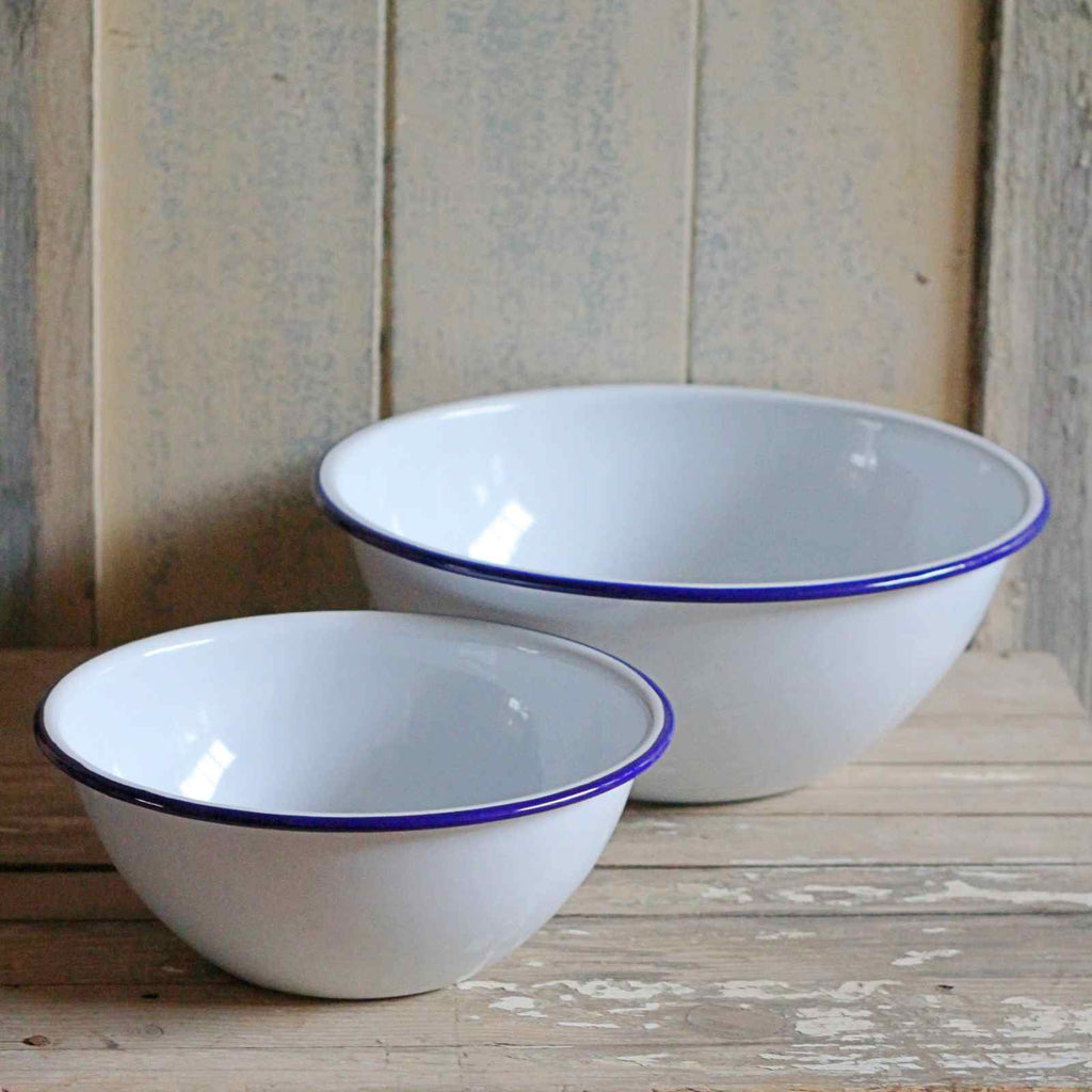 White enamel mixing bowl with blue rim