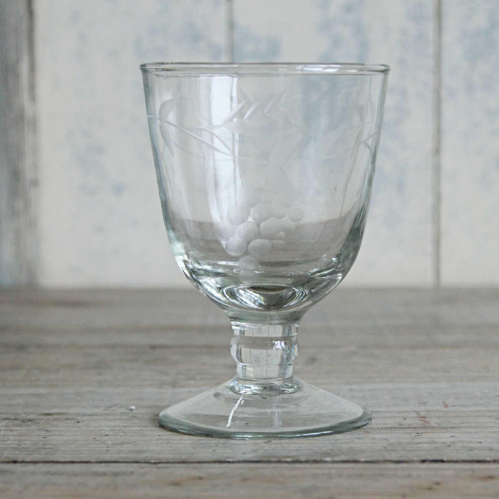 Elegant vintage style wine glass, hand blown and etched with a delicate pattern of rambling vine leaves.