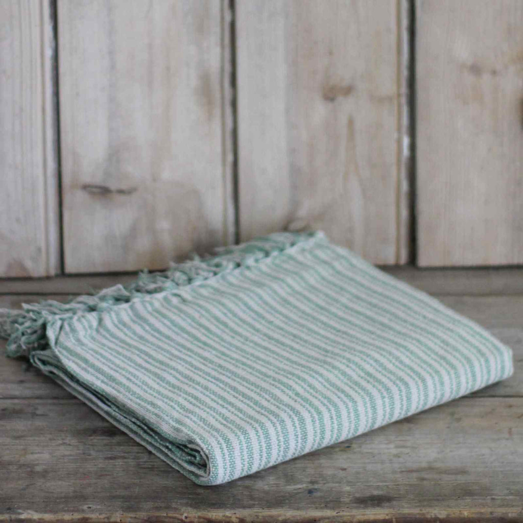 Throw blankets in green stripe