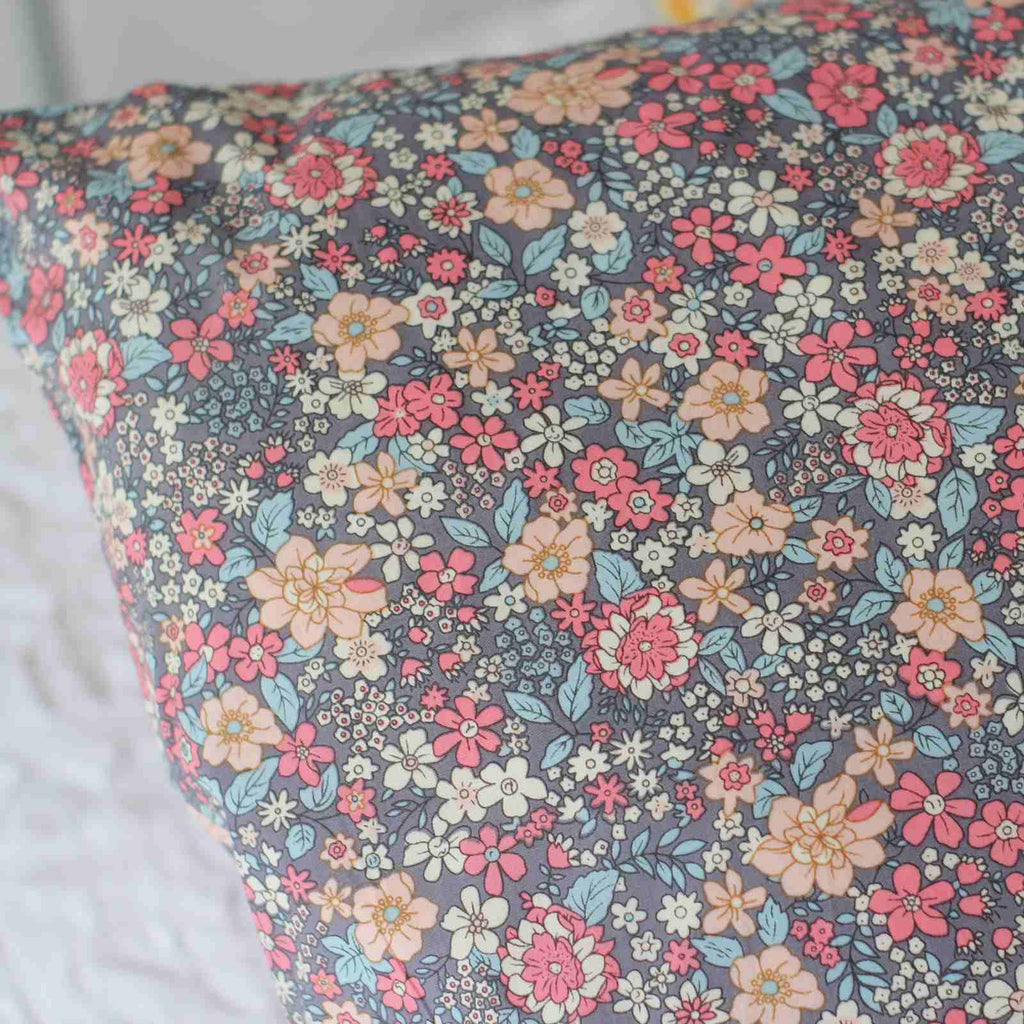 vintage style cushion in lavender close up of pattern