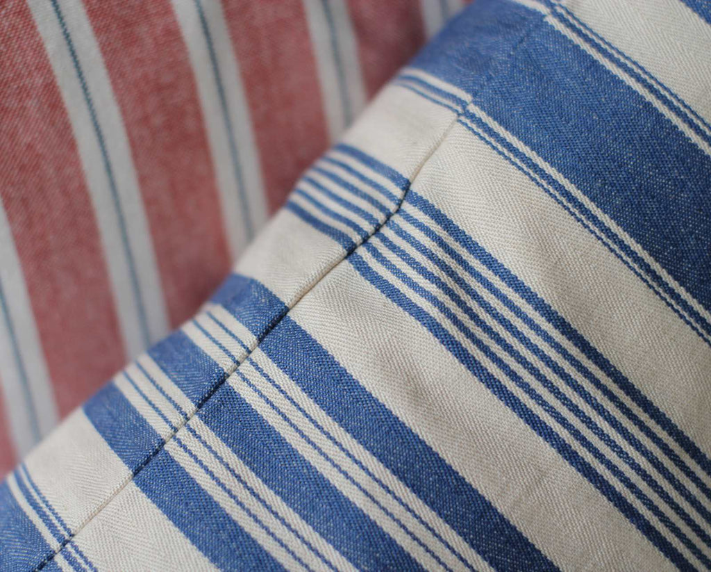 vintage style cushion with blue stripe detail