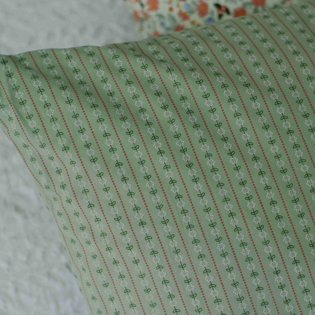 vintage style cushion in green pattern detail