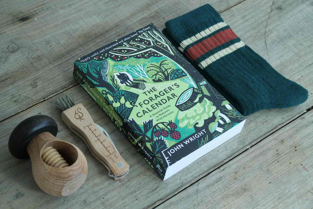 Boxed Gift - Our 'Forager's' Gift Box contains a copy of 'The Forager's Calendar' by John Wright, a seasonal guide for anyone interested in wild food. Alongside this is a Mushroom Knife, a beech Mushroom Nutcracker, and a pair of Men's Ribbed Cotton Socks in Green & Rust.