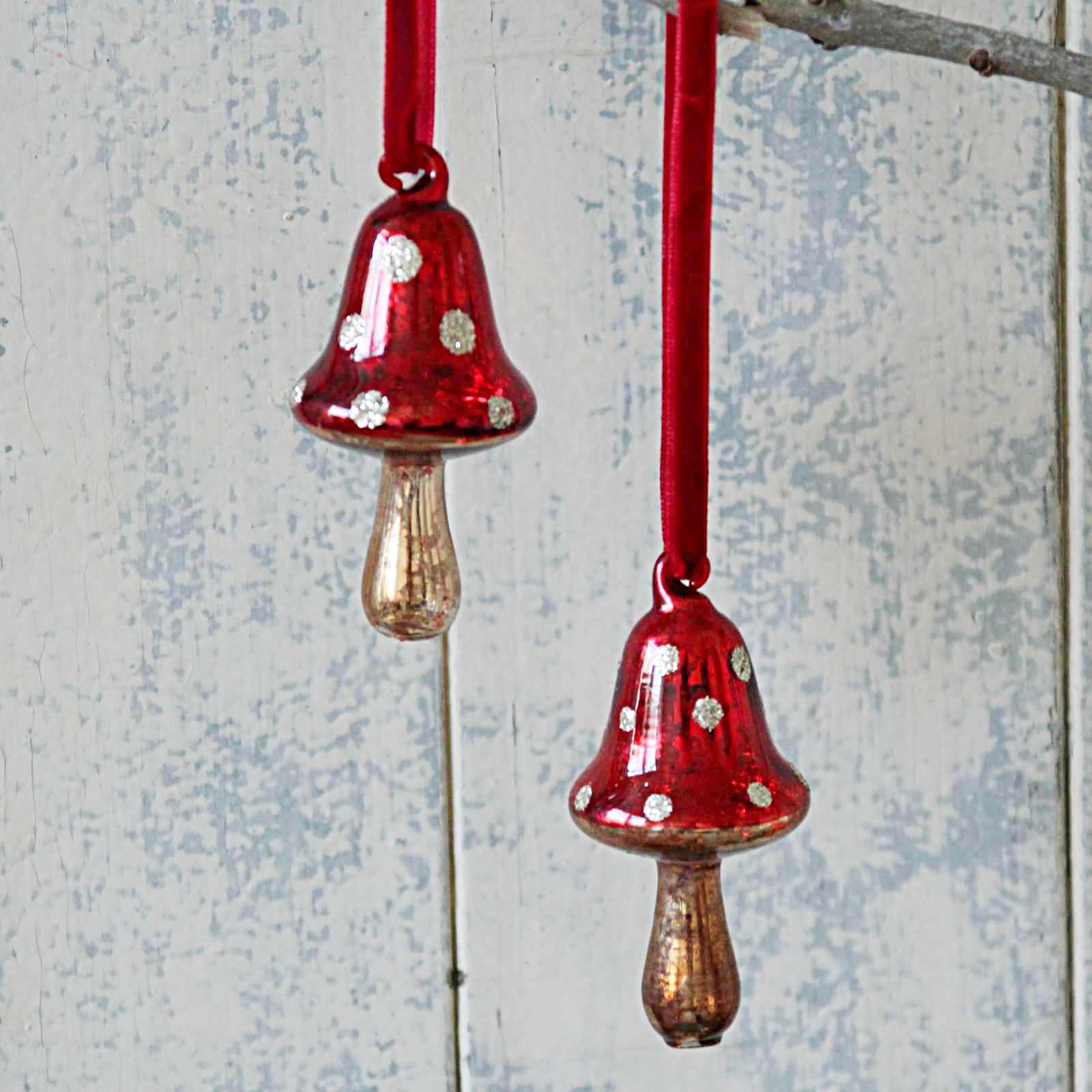 Glass Toadstool Decoration with gold glitter spots and a red velvet ribbon. A beautiful, Victorian style vintage Christmas decoration for your tree.