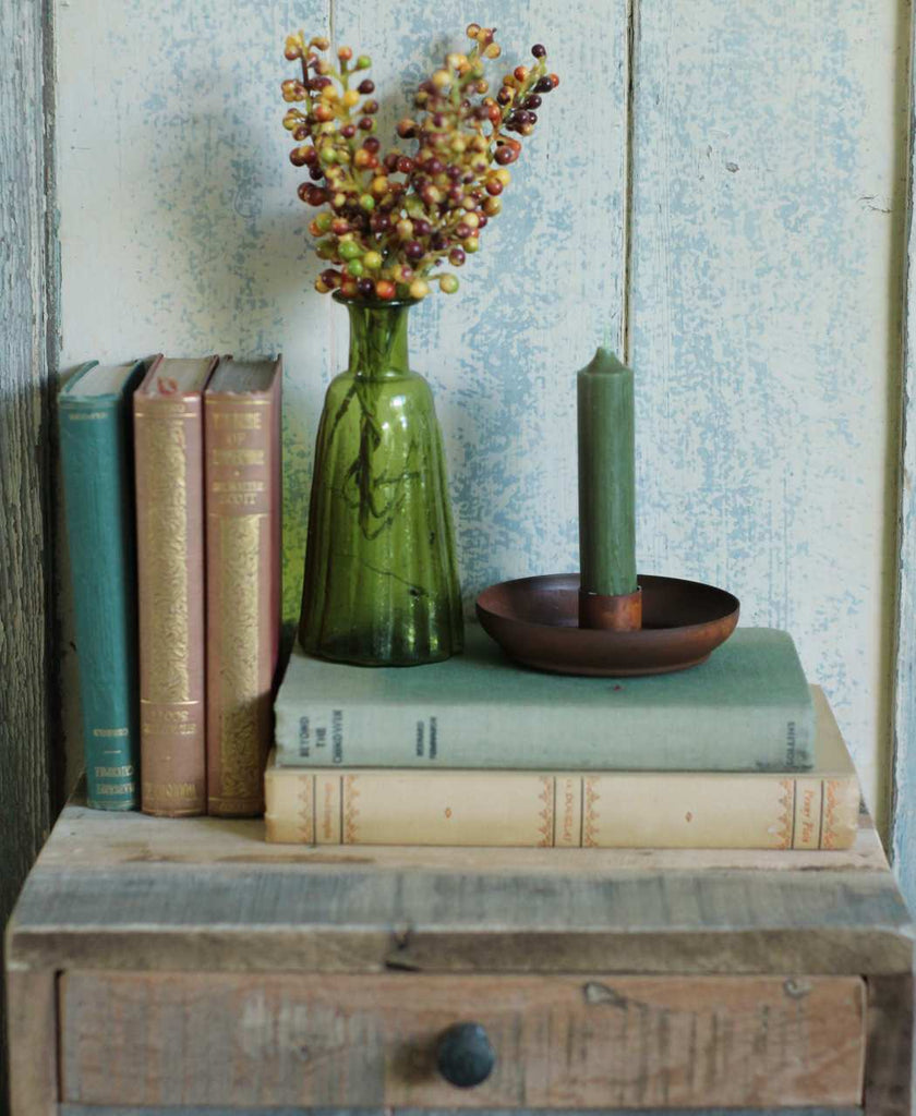 Vintage interior, vintage books, Autumn berries with green glass vase
