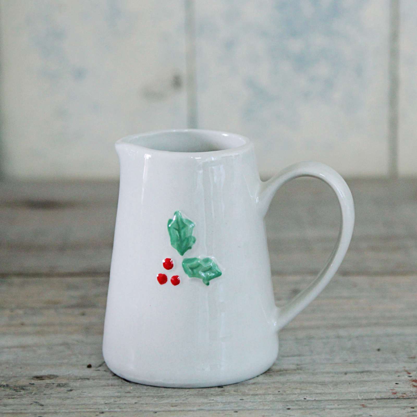 Adorable ceramic Holly Cream Jug. A lovely gift, this little jug is perfect for the Christmas table. 