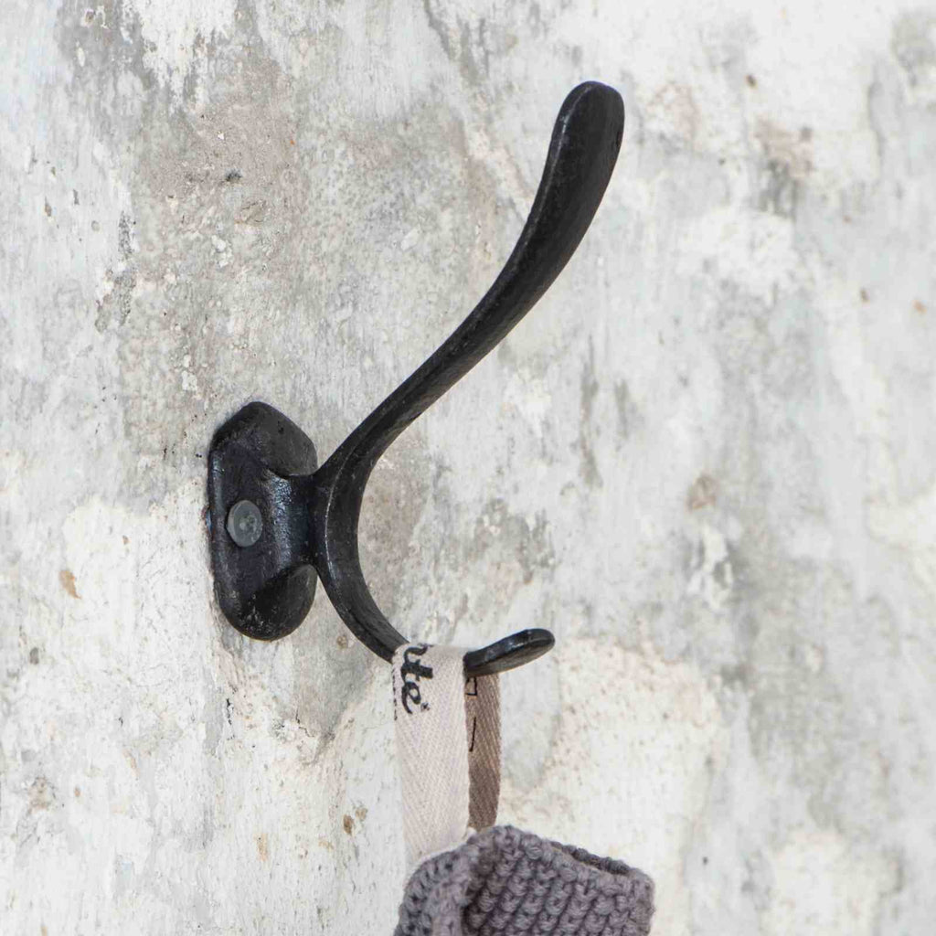 Vintage hook black iron on wall