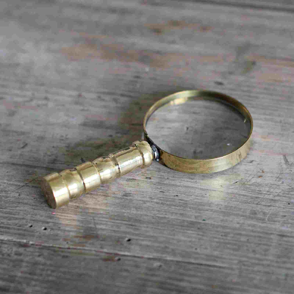 brass magnifying glass
