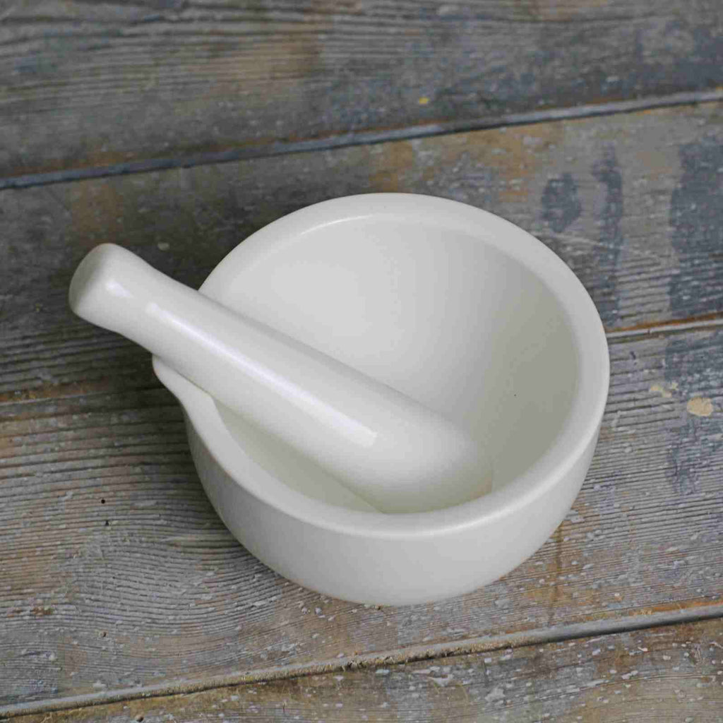 pestle and mortar in white