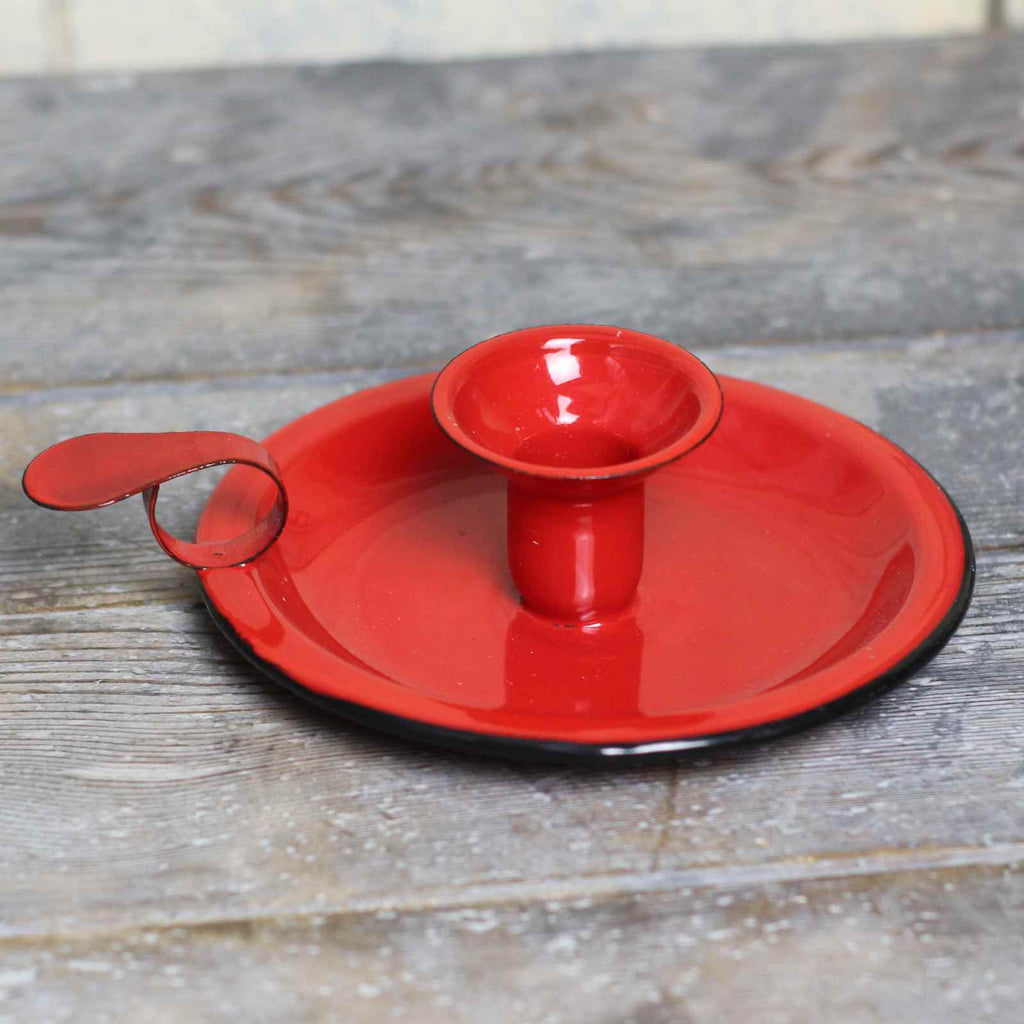 candle holder in red enamel with black rim